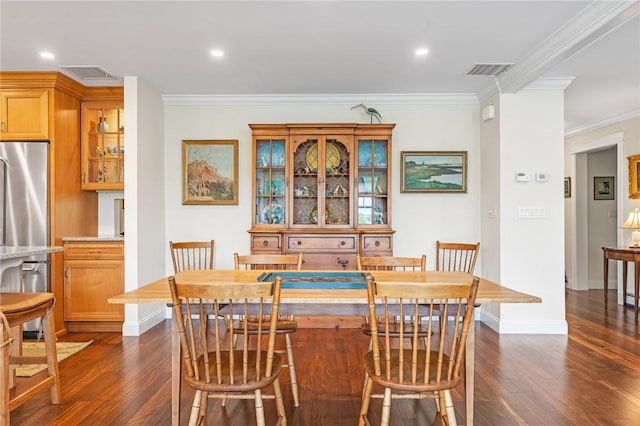 583 Highland Rd, Tiverton, RI 02878 - dining room with dark wood-style flooring, crown molding, and recessed lighting