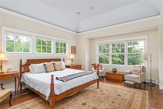 583 Highland Rd, Tiverton, RI 02878 - bedroom with a baseboard heating unit and wood finished floors