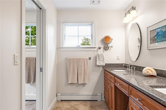 583 Highland Rd, Tiverton, RI 02878 - full bath featuring a baseboard radiator and double vanity
