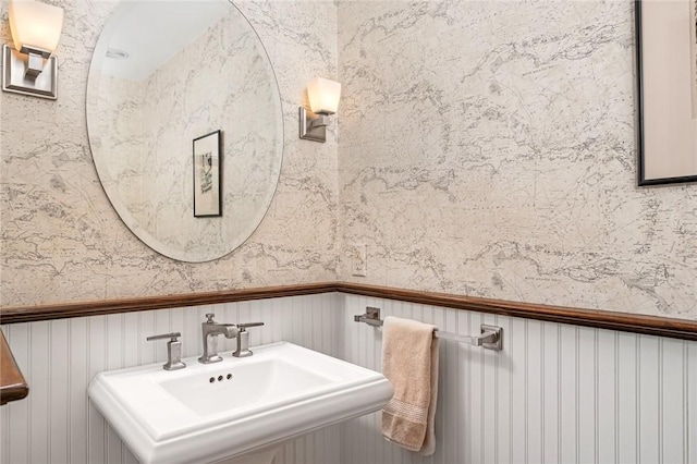 583 Highland Rd, Tiverton, RI 02878 - bathroom with a sink and wainscoting