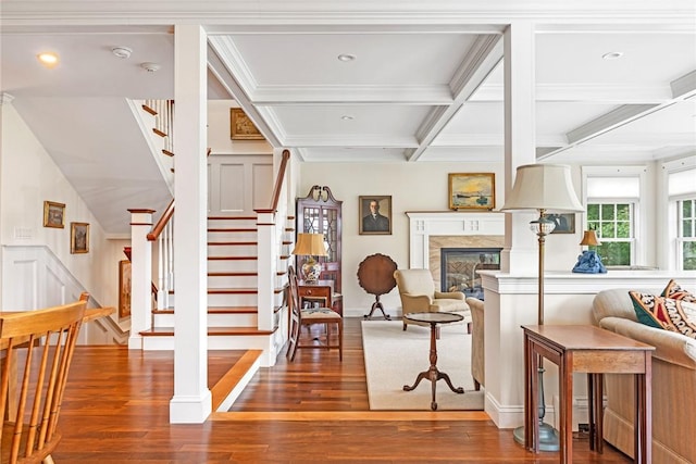 583 Highland Rd, Tiverton, RI 02878 - staircase with wood finished floors, beam ceiling, coffered ceiling, a high end fireplace, and crown molding