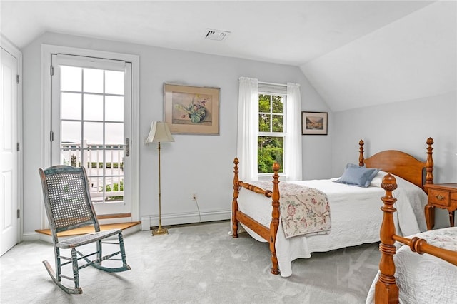 583 Highland Rd, Tiverton, RI 02878 - carpeted bedroom featuring a baseboard radiator, vaulted ceiling, and access to exterior
