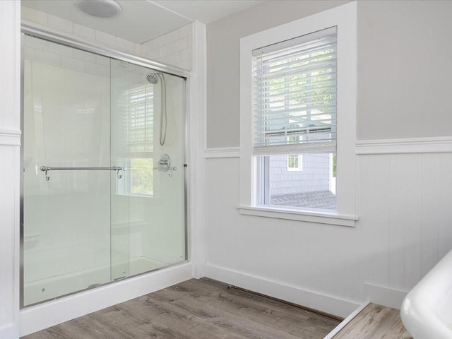 96 Ashaway Rd, Westerly, RI 02891 - full bathroom featuring a shower stall, wood finished floors, and a wainscoted wall