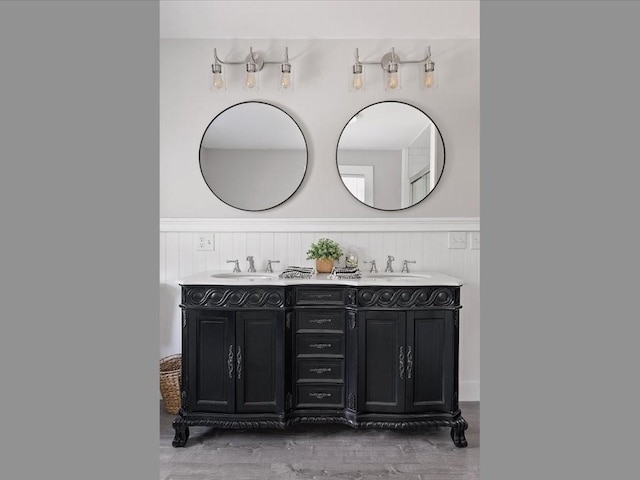96 Ashaway Rd, Westerly, RI 02891 - full bathroom with double vanity, wood finished floors, and wainscoting