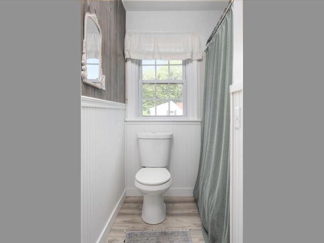 96 Ashaway Rd, Westerly, RI 02891 - bathroom featuring wood finished floors and a shower with shower curtain