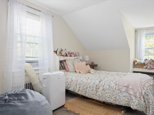96 Ashaway Rd, Westerly, RI 02891 - bedroom featuring vaulted ceiling, wood finished floors, and radiator
