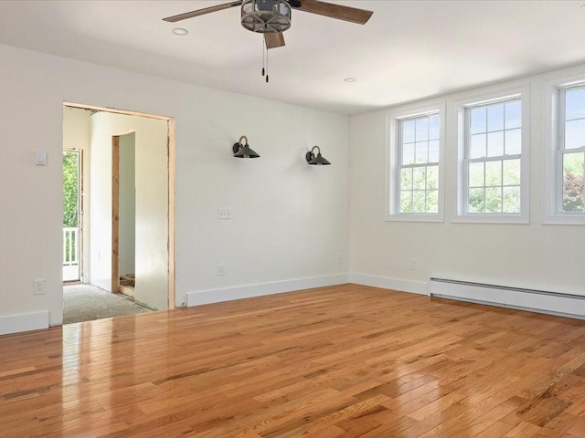 96 Ashaway Rd, Westerly, RI 02891 - empty room with a ceiling fan, a baseboard heating unit, and wood finished floors