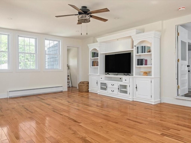 96 Ashaway Rd, Westerly, RI 02891 - unfurnished living room with a baseboard radiator, light wood finished floors, and a ceiling fan