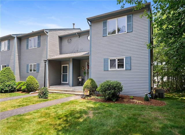 36 Primrose Ln Unit 36, North Providence, RI 02904 - view of front facade with a front lawn and a porch