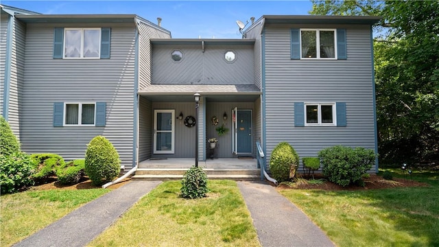 36 Primrose Ln Unit 36, North Providence, RI 02904 - view of property with a porch and a front yard
