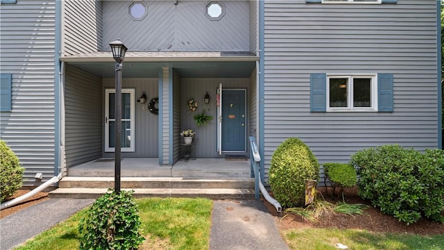 36 Primrose Ln Unit 36, North Providence, RI 02904 - property entrance featuring covered porch