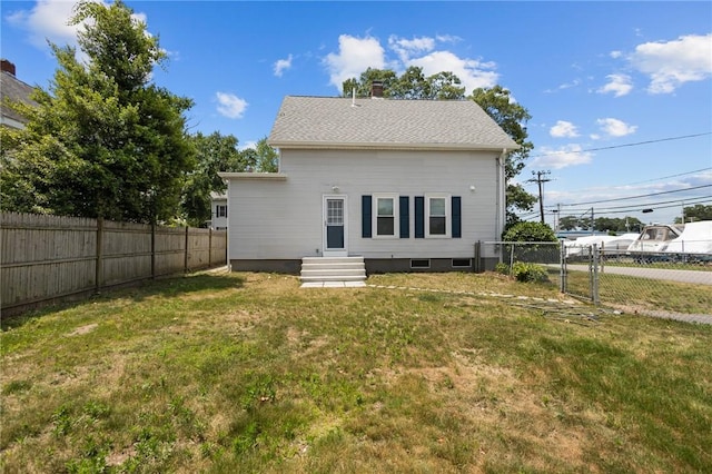 358 Pawtuxet Ave, Warwick, RI 02888 - back of property with entry steps, a fenced backyard, and a chimney