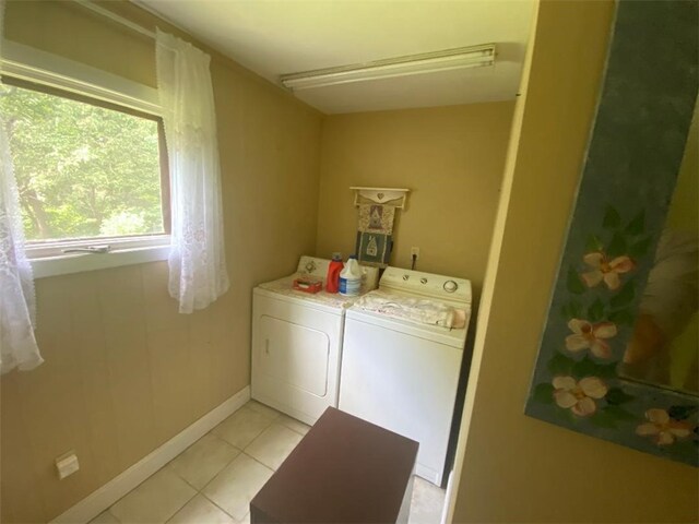 163 Reynolds Ave, Warwick, RI 02889 - laundry area featuring washing machine and clothes dryer and light tile patterned floors