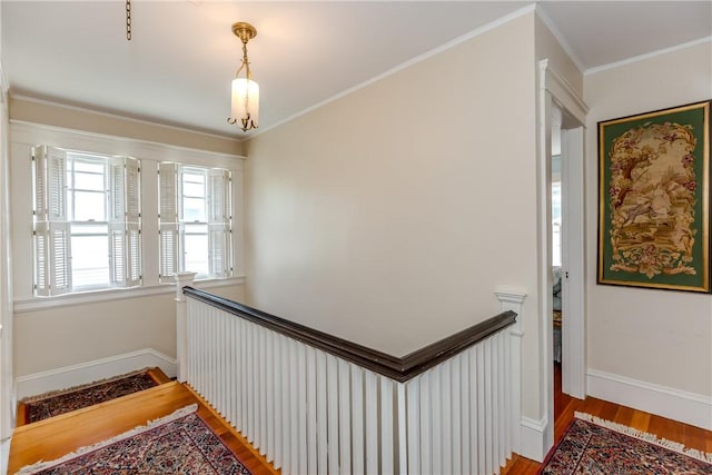 65 Lyndhurst Ave, Providence, RI 02908 - hallway with light wood-style floors, an upstairs landing, and crown molding