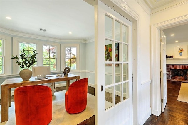 290 Blackstone Blvd, Providence, RI 02906 - dining room featuring wood finished floors, crown molding, an office area, a brick fireplace, and recessed lighting