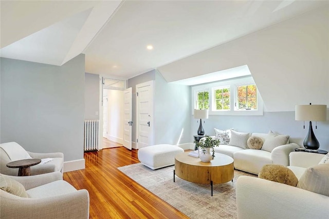 290 Blackstone Blvd, Providence, RI 02906 - living area with radiator, wood finished floors, and recessed lighting