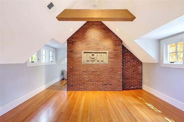290 Blackstone Blvd, Providence, RI 02906 - additional living space featuring wood finished floors, brick wall, lofted ceiling, and plenty of natural light