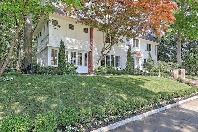 290 Blackstone Blvd, Providence, RI 02906 - view of front of house with a front yard and brick siding