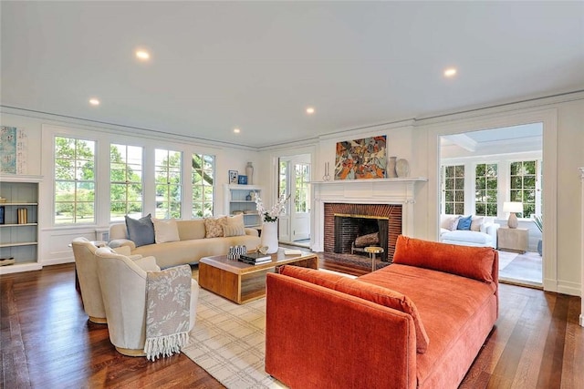 290 Blackstone Blvd, Providence, RI 02906 - living area with crown molding, a fireplace, wood finished floors, and recessed lighting