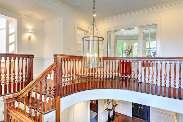 290 Blackstone Blvd, Providence, RI 02906 - stairs featuring ornamental molding, a chandelier, and wood finished floors