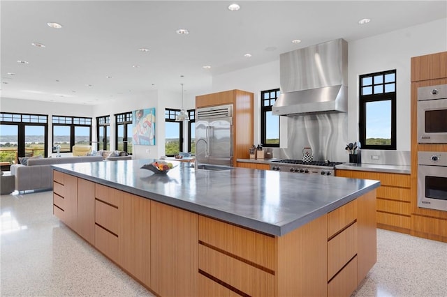82 Nonquit Ln, Tiverton, RI 02878 - kitchen featuring modern cabinets, dark aggregate flooring, built in fridge, a large island, and recessed lighting