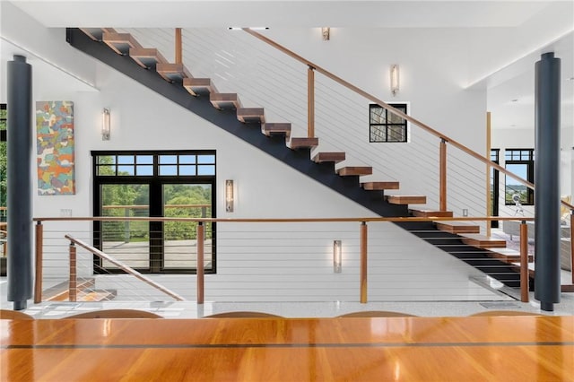 82 Nonquit Ln, Tiverton, RI 02878 - stairway with a high ceiling