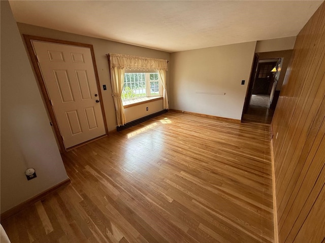 26 Flora Ave, Woonsocket, RI 02895 - spare room with wood finished floors and baseboards