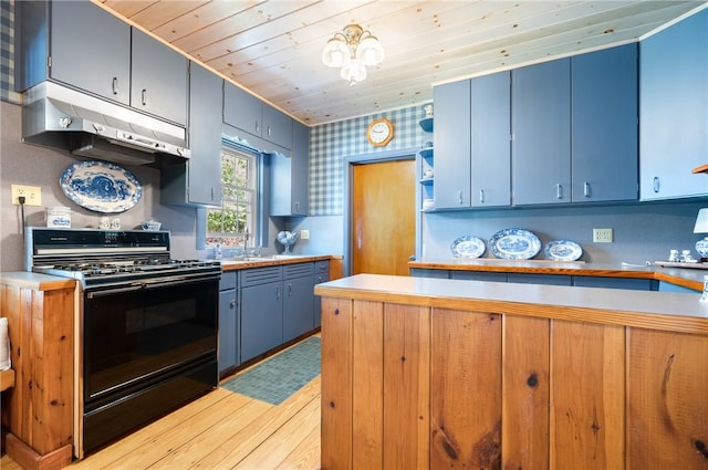 355 Scott Rd, Cumberland, RI 02864 - kitchen featuring black range with gas stovetop, under cabinet range hood, blue cabinetry, light wood-style floors, and wood ceiling