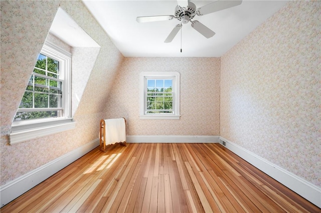 355 Scott Rd, Cumberland, RI 02864 - additional living space with wood-type flooring, wallpapered walls, and ceiling fan