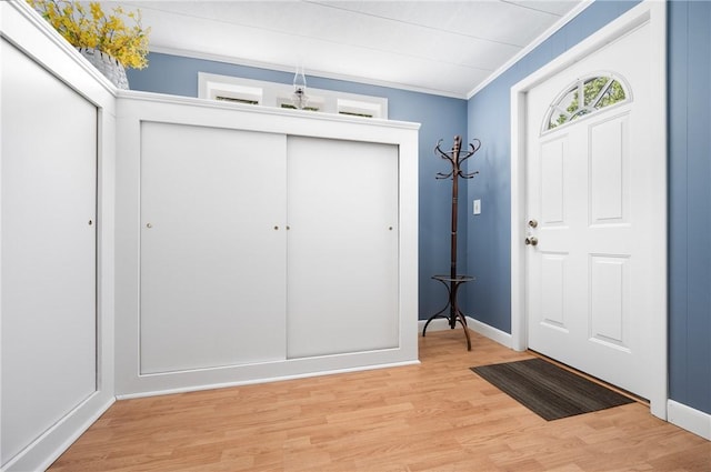 355 Scott Rd, Cumberland, RI 02864 - entrance foyer with light wood-style floors and crown molding