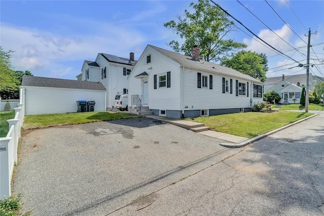 60 Hazael St, Providence, RI 02908 - view of front of property with a chimney