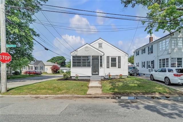 60 Hazael St, Providence, RI 02908 - view of front of house with a front yard and entry steps