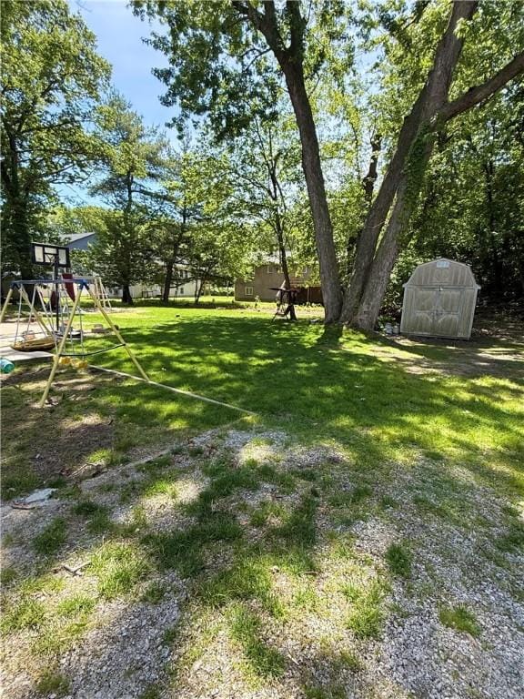 26 Westmore St, Providence, RI 02910 - view of green lawn featuring a storage shed and a playground
