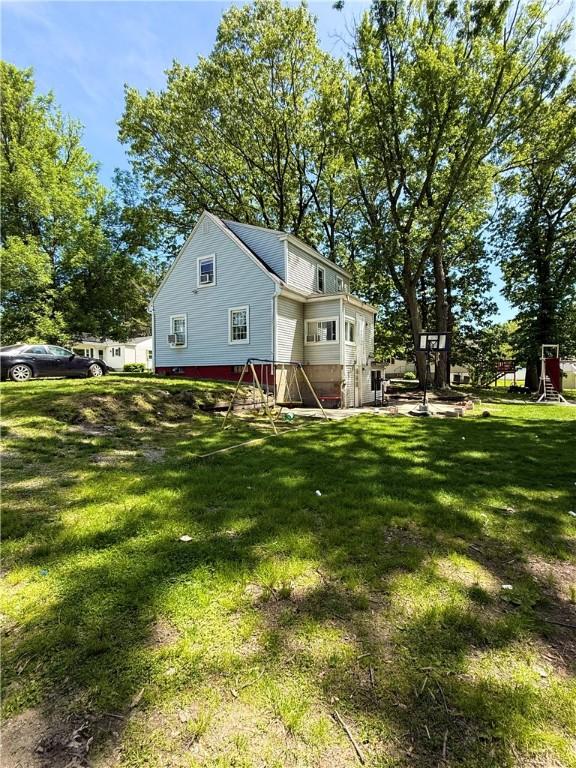 26 Westmore St, Providence, RI 02910 - view of side of home with a yard