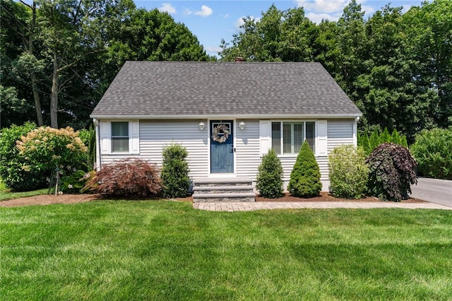 32 Spencer Rd, Smithfield, RI 02828 - view of front facade with a front yard and roof with shingles