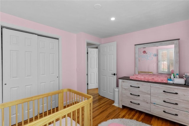 32 Spencer Rd, Smithfield, RI 02828 - bedroom with dark wood-style floors, a closet, and recessed lighting