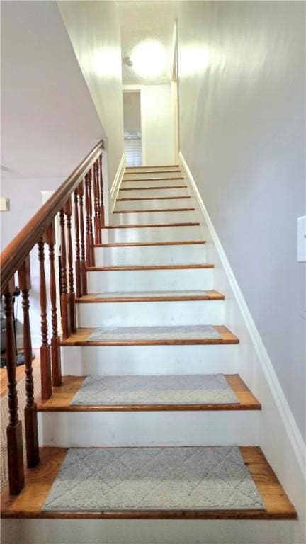 61 Terrace Ave, Pawtucket, RI 02860 - staircase featuring wood finished floors