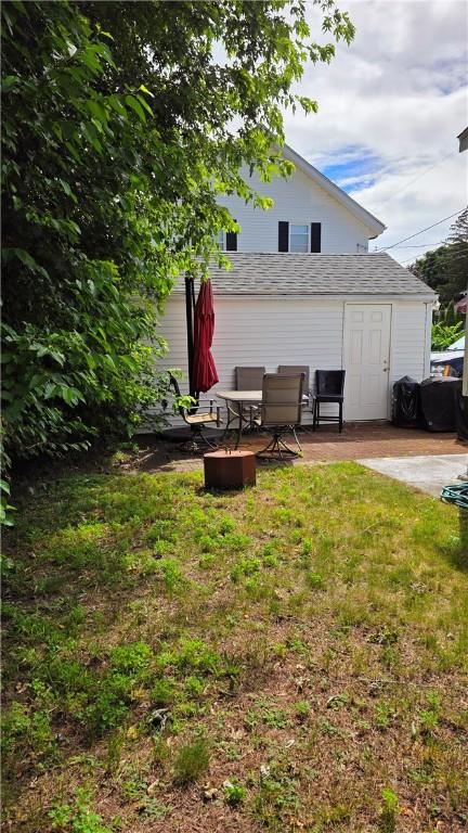 61 Terrace Ave, Pawtucket, RI 02860 - view of grassy yard with a patio area