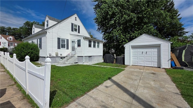 61 Terrace Ave, Pawtucket, RI 02860 - view of front facade with an outdoor structure, a detached garage, and concrete driveway