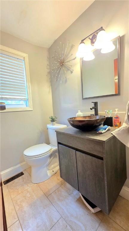 61 Terrace Ave, Pawtucket, RI 02860 - bathroom featuring vanity and tile patterned flooring