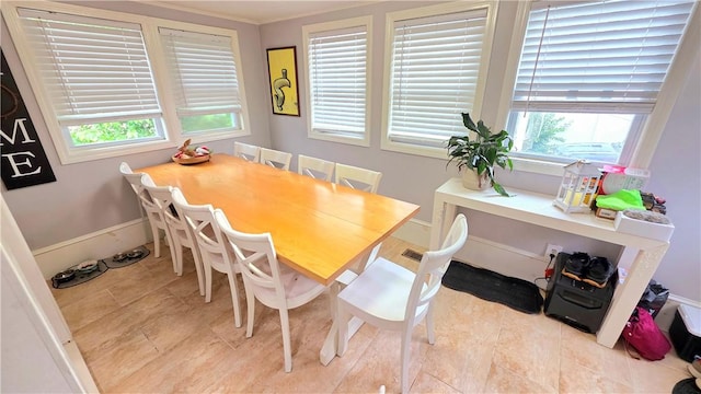 61 Terrace Ave, Pawtucket, RI 02860 - dining room with light tile patterned floors and baseboards