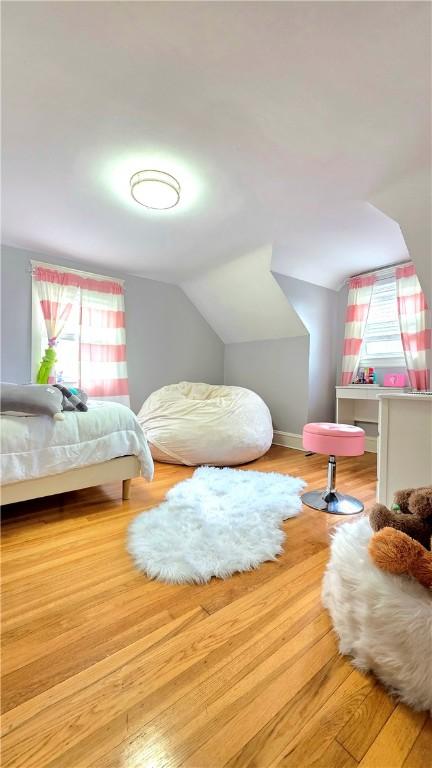 61 Terrace Ave, Pawtucket, RI 02860 - bedroom featuring lofted ceiling and wood finished floors