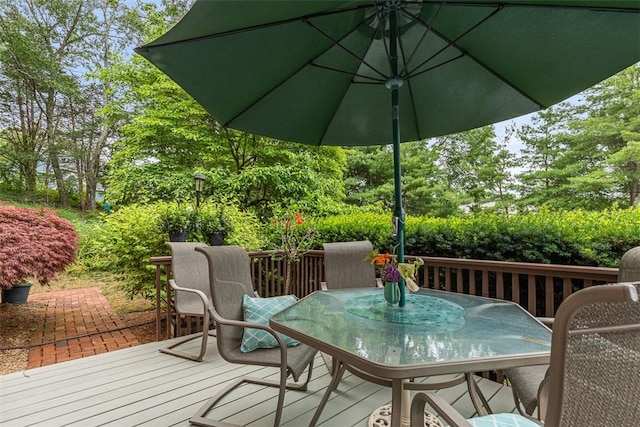 4 Wilbur Rd, Lincoln, RI 02865 - wooden terrace with outdoor dining area