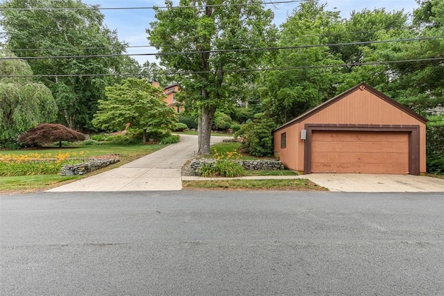 4 Wilbur Rd, Lincoln, RI 02865 - view of front facade with a detached garage