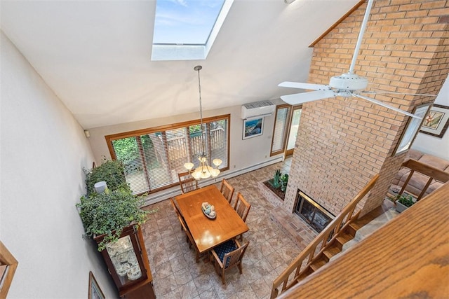 4 Wilbur Rd, Lincoln, RI 02865 - living area with a skylight, lofted ceiling, a chandelier, a wall mounted air conditioner, and a ceiling fan