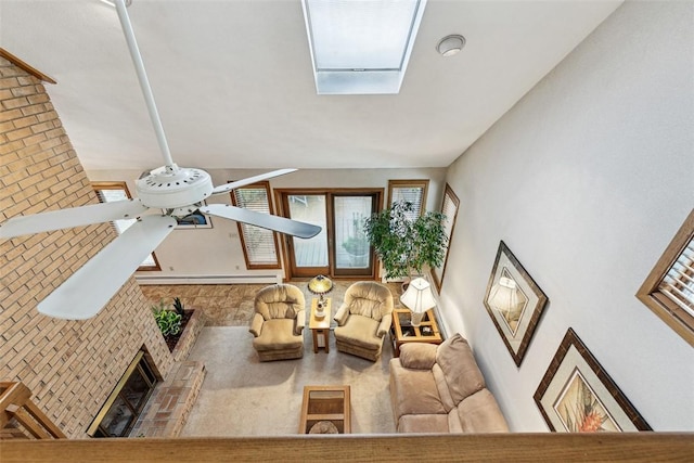 4 Wilbur Rd, Lincoln, RI 02865 - living area featuring a skylight, a ceiling fan, and lofted ceiling