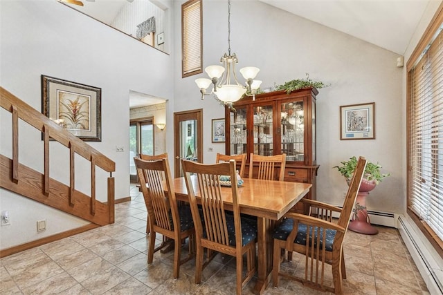 4 Wilbur Rd, Lincoln, RI 02865 - dining room featuring healthy amount of natural light, a chandelier, high vaulted ceiling, baseboard heating, and stairs