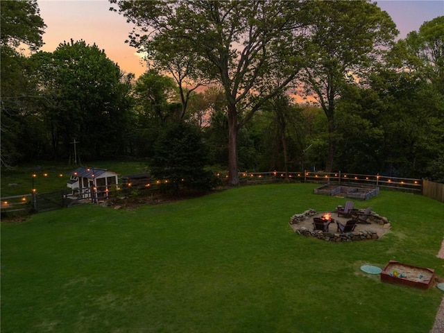 40 Charlotte Ave, North Kingstown, RI 02874 - view of yard with a fire pit and a vegetable garden