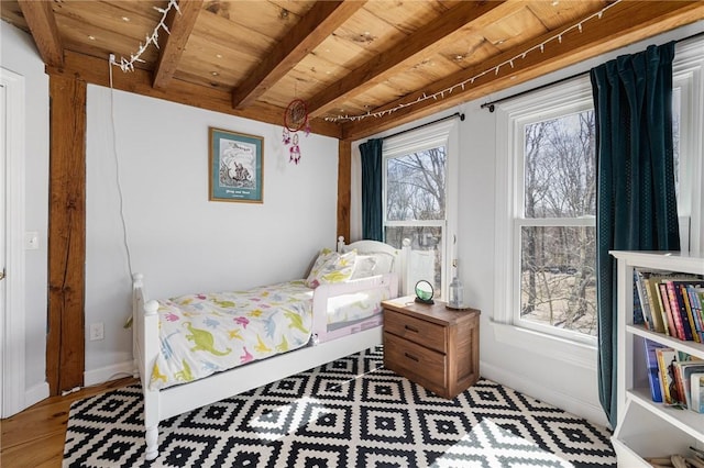40 Charlotte Ave, North Kingstown, RI 02874 - bedroom featuring a wooden ceiling with exposed beams and wood finished floors