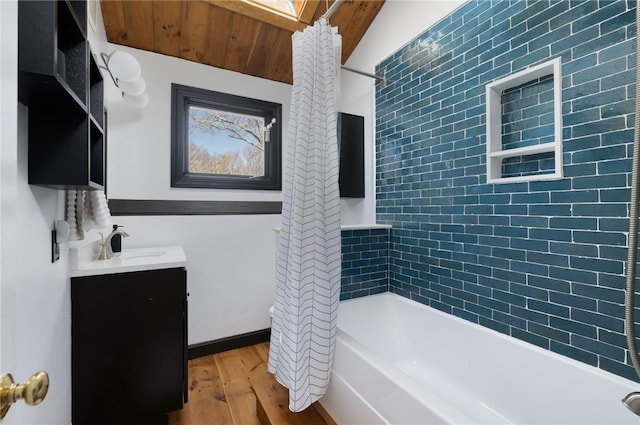 40 Charlotte Ave, North Kingstown, RI 02874 - full bath with wood finished floors, vanity, and shower / bath combo with shower curtain